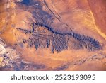 Land features in the area of 
Balkanabat,Turkmenistan. Digital enhancement of an image by NASA