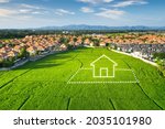 Land or landscape of green field in aerial view. Include agriculture farm, icon of residential, home or house building. Real estate or property for dream concept to build, construction, sale and buy.
