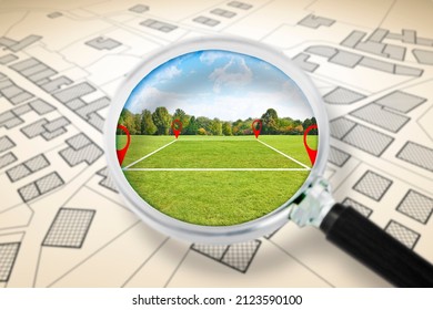 Land management with an imaginary cadastral map of territory with a vacant land available for sale or building construction - Note: the map background is totally invented and does not represent any re