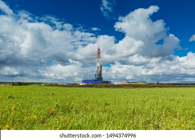 Land oil drilling rig blue sky