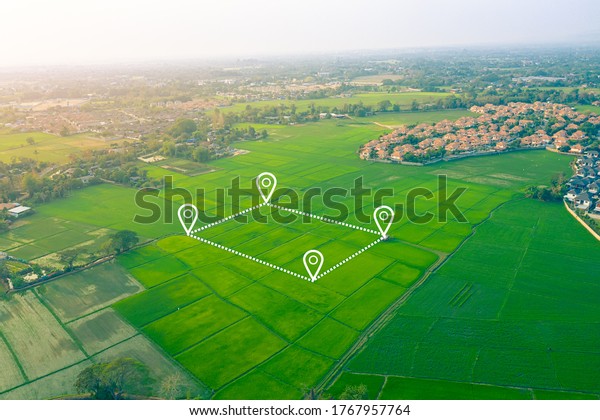 Land plot in aerial view. Gps registration
survey of property, real estate for map with location, area.
Concept for residential construction, development. Also home or
house for sale, buy,
investment.