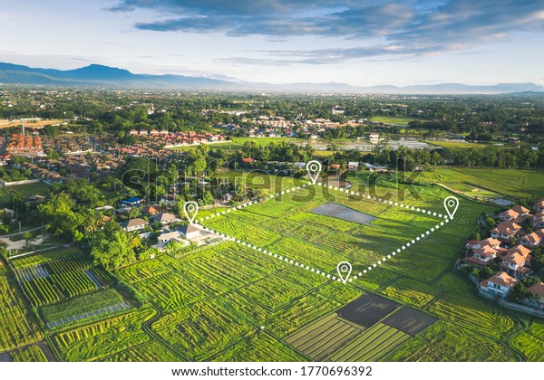 Land plot in aerial view. Gps registration\
survey of property, real estate for map with location, area.\
Concept for residential construction, development. Also home or\
house for sale, buy,\
investment.