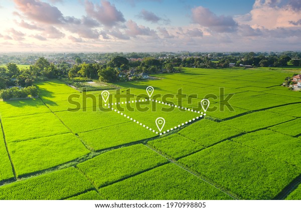 Land plot in aerial view. Gps registration\
survey of property, real estate for map with location, area.\
Concept for residential construction, development. Also home or\
house for sale, buy,\
investment.