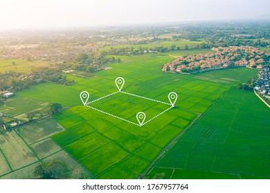 Land plot in aerial view. Include landscape, real estate, green field, agricultural plant, pin location icon. For housing subdivision, residential, development, owned, sale, rent, buy or investment.
