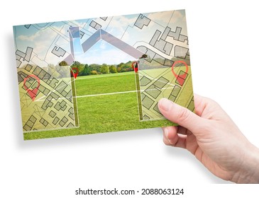 Land plot management - Imaginary city map with buildings, land parcels and home silhouette - real estate concept with a vacant land on a green field available for building construction - Shutterstock ID 2088063124
