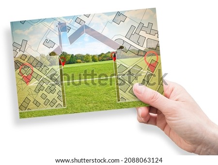 Land plot management - Imaginary city map with buildings, land parcels and home silhouette - real estate concept with a vacant land on a green field available for building construction