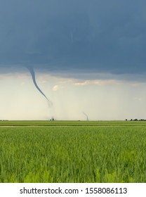 A Land Spout Tornadoes Reaches Down to the Ground