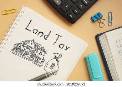 Land Tax Is Shown On A Business Photo Using The Text