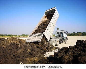 Landfill By Truck At Construction Site 