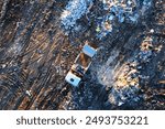 Landfill with waste disposal, aerial view. Garbage dump. Garbage truck unloads rubbish in landfill. Mustard gas among toxic waste in landfill. Landfill garbage truck, drone view.