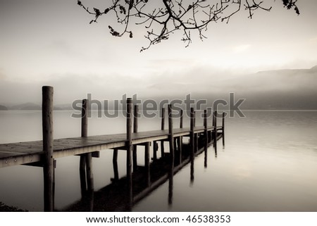 A landing jetty at Derwent water on a misty Autumn morning