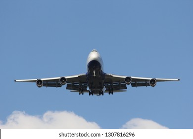 Landing Jumbo Jet In The Blue Sky 