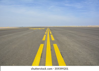  Landing Light Directional Sign Markings On The Tarmac Of Runway At A Commercial Airport