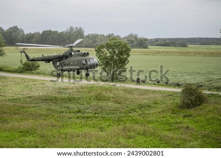Landing of soldiers from the Mi 8 military helicopter. Military exercises. Improvement of military skills.