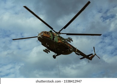 Landing of special forces on a rope from a helicopter	