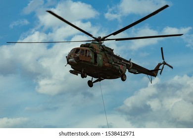 Landing of special forces on a rope from a helicopter	