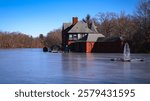 Landmark boathouse and pavilions over Polo Lake at Roger Williams Park, Providence, Rhode Island, USA