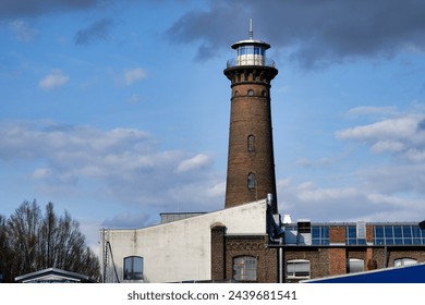 landmark of cologne ehrenfeld, the historic helios lighthouse and the rheinlandhalle
