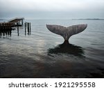 Landmark of Fabborg in Denmark - The whale tale in the ferry port with the opposite islands in the background