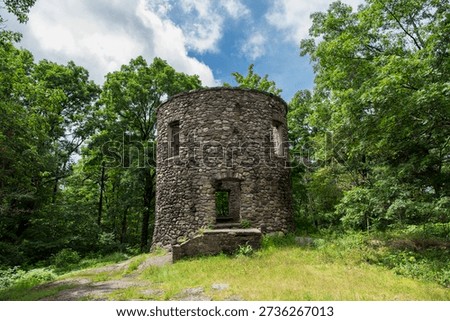 The landmark stone Cunningham Tower on the mohawk mattatuck trail on Mohawk Mountain in Goshen Connecticut.