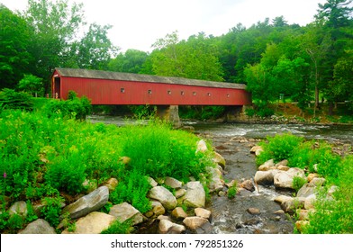 The landmark West Cornwall covered bridge over the Housatonic River in West Cornwall Connecticut in the summer.  