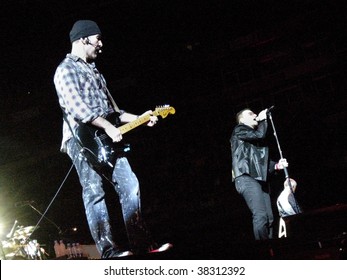 LANDOVER, MD - SEPT 29, 2009: The Edge, Guitarist Of The Irish Rock Band U2, Performs Live With Vocalist Bono And Bassist Adam Clayton At FedEx Field During The Band's 