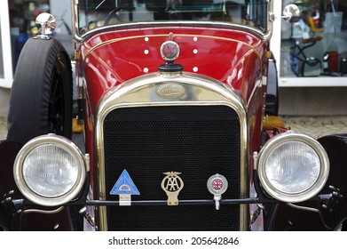 LANDSBERG, GERMANY - JULY 12, 2014: Public oldtimer rally in Bavarian city Landsberg for at least 80 years old veteran cars with a front view of Sunbeam 25 HP, built at year 1926 - Shutterstock ID 205642846