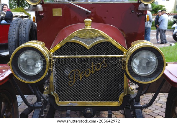 LANDSBERG, GERMANY -\
JULY 12, 2014: Public oldtimer rally in Bavarian city Landsberg for\
at least 80 years old veteran cars with a front view of Protos F32,\
built at year 1909