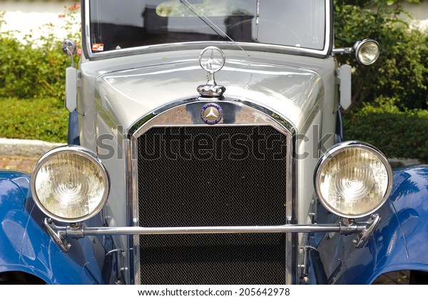 LANDSBERG,\
GERMANY - JULY 12, 2014: Public oldtimer rally in Bavarian city\
Landsberg for at least 80 years old veteran cars with a front view\
of Mercedes Stuttgart, built at year\
1930