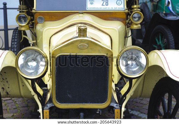 LANDSBERG, GERMANY - JULY\
12, 2014: Public oldtimer rally in Bavarian city Landsberg for at\
least 80 years old veteran cars with a front view of Stellite,\
built at year 1915