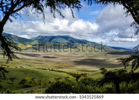 Landscae from the edge of the Ngorongoro Crater in the direction of the Serengeti and the mountains in the area