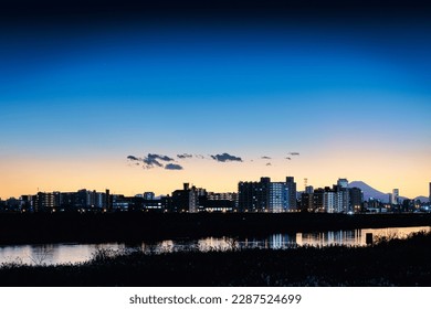 The landscape of Adachi -ku in the evening in the outskirts of Tokyo seen from the Arakawa riverbed - Shutterstock ID 2287524699