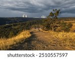 Landscape around Dukovany nuclear power plant. In the foreground, the Mohel steppe and a valley with a water reservoir.