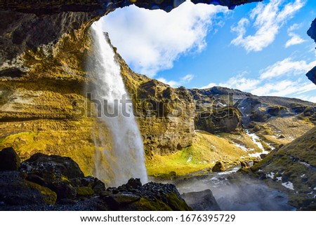 the landscape around the hidden waterfall named Kvernufoss waterfall