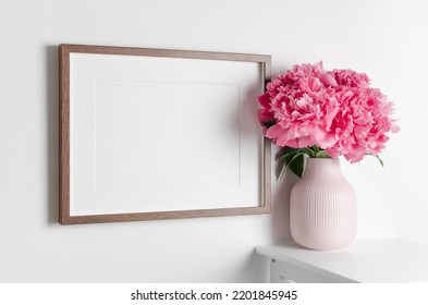 Landscape Artwork Frame Mockup On White Wall With Fresh Flowers