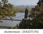 Landscape of the autumn city of Kyiv. The city of Kyiv is located on the banks of the Dnieper. Monument to St. Volodymyr in Kyiv.