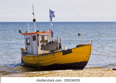 Landscape With Baltic Sea. Fishing Boat On The Beach.