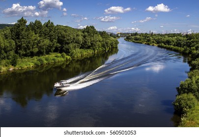 Landscape of banks of the river, speed boat on the river, summer day.View from above. - Powered by Shutterstock