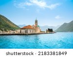 Landscape of the Bay of Kotor coastline - Boka Bay with view to the Roman Catholic Church of Our Lady of the Rocks,  Montenegro
