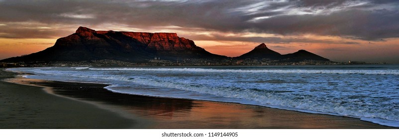 Landscape With Beach And Table Mountain At Sunrise
