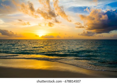 Landscape of beautiful sunset in Maldives island sandy beach with colorful sky and dramatic  clouds over wavy sea - Shutterstock ID 678814507
