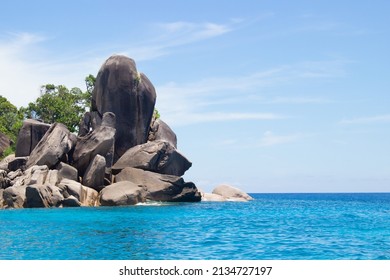 Landscape With Bizarre Giant Rocks In Turquoise Water Of Andaman Sea Near Similan Islands In Thailand. Beautiful Tropical Seascape. Travel, Tourism And Resort Background.