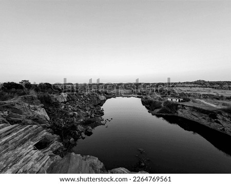 Similar – Foto Bild Strand mit Felsen und Pfütze im Sonnenuntergang, Ribadeo, Lugo, Galizien, Spanien