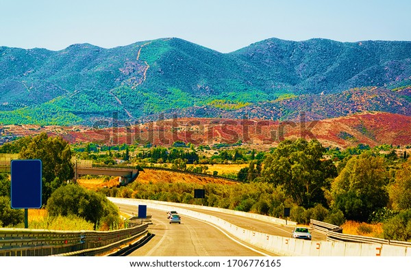 Landscape of Car in road in\
summer Italy. Vacation trip on highway with nature. Scenery with\
drive on Holiday journey at mountain. Motion ride in Europe.\
Transport