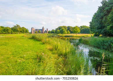 Landscape with a castle in sunlight in summer