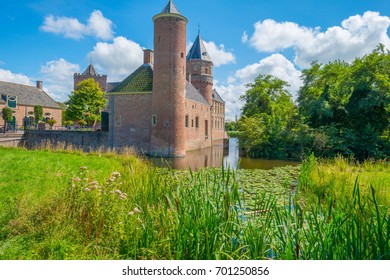 Landscape with a castle in sunlight in summer