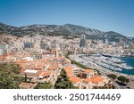 Landscape of the city of Monaco. Panorama of Monaco from the La Condamine district. View of the different districts of Monaco. Monaco buildings and residences. Mediterranean coastal city