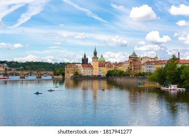 The landscape of the city of Prague view from the Vltava river on the ancient architecture of the city. Prague / Czechia - 05.21.2019