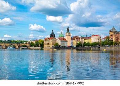 The landscape of the city of Prague view from the Vltava river on the ancient architecture of the city. Prague, Czech Republic - 05.21.2019