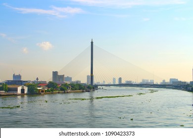 Landscape city View of Rama 8 Bridge on the Chao Phraya River With light in the morning.